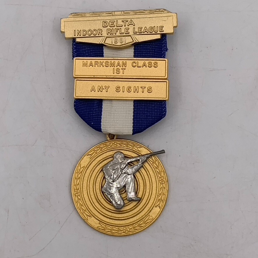 VTG Delta Indoor Rifle League 1981 Metallic Marksman 1st Medal Award Pin Badge