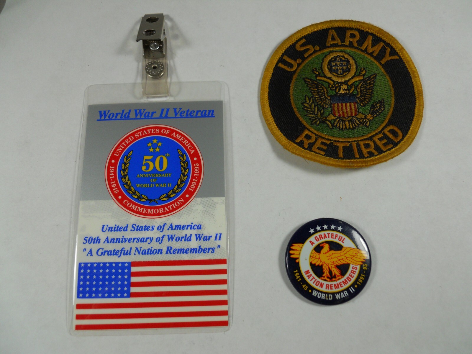 numbered WWII Veteran 50th Anniversary pass badge, pin & Army Retired patch