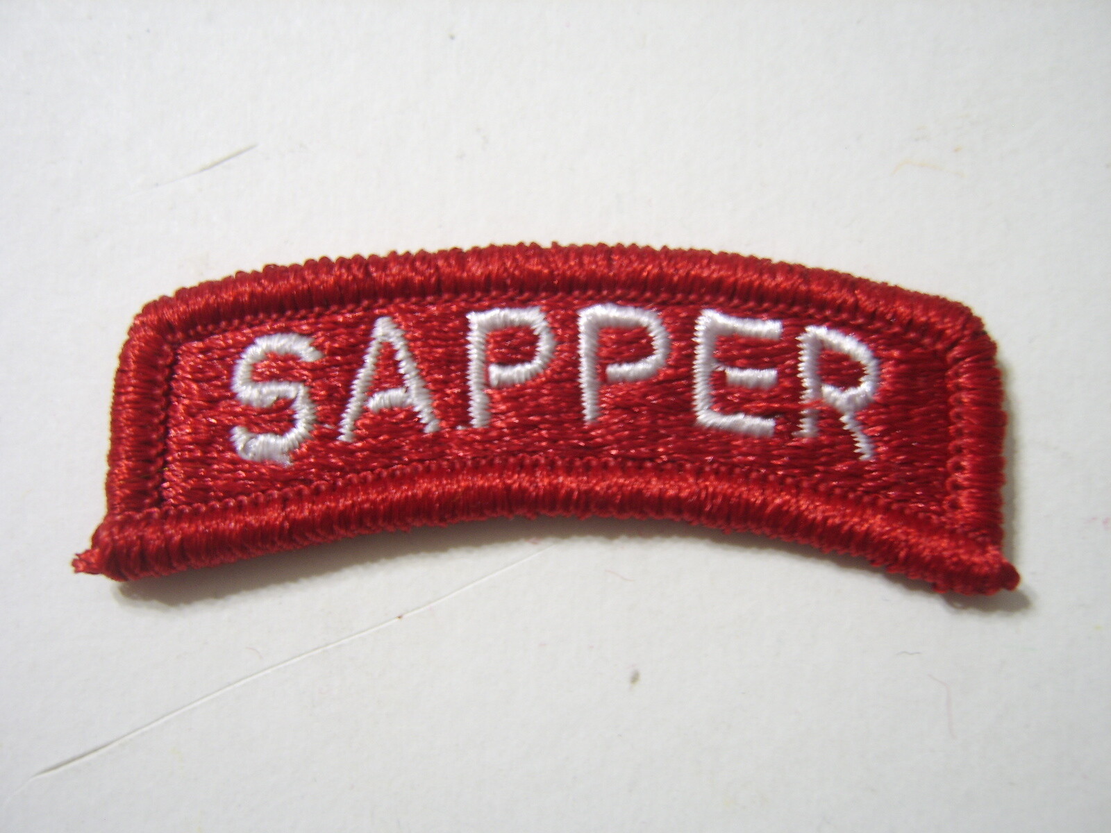 SAPPER TAB WHITE ON RED – ARMY ENGINEER TAB