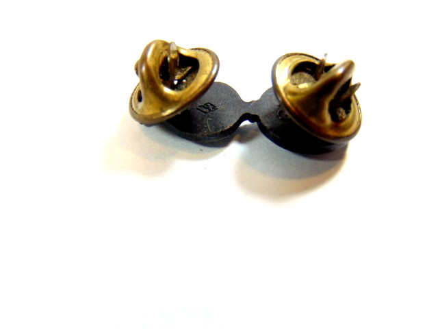 small British military black metal flaming grenade uniform insignia pin